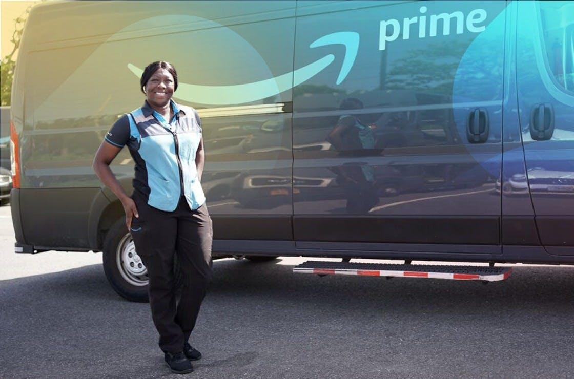 Amazon Employee standing next to Amazon Prime Van